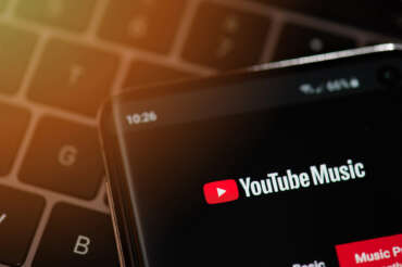 Up close view of the YouTube Music app logo on a smartphone screen.