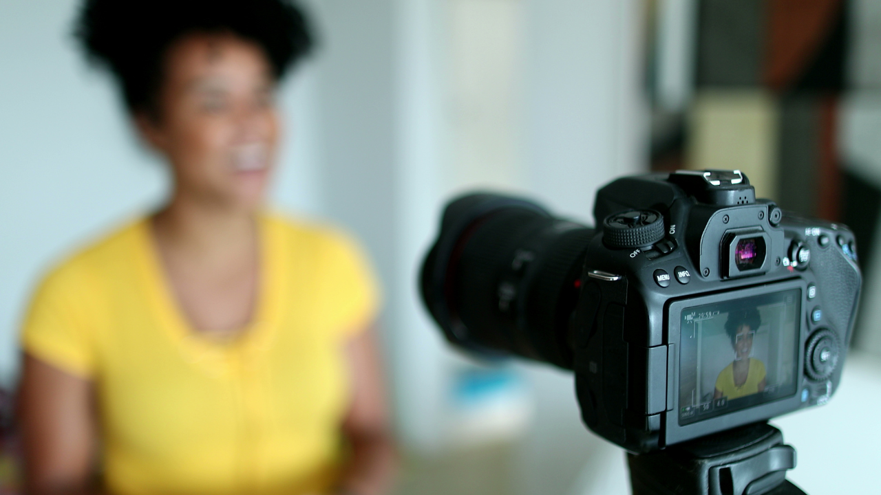 A customer sharing their experience during a testimonial video shoot in Orlando