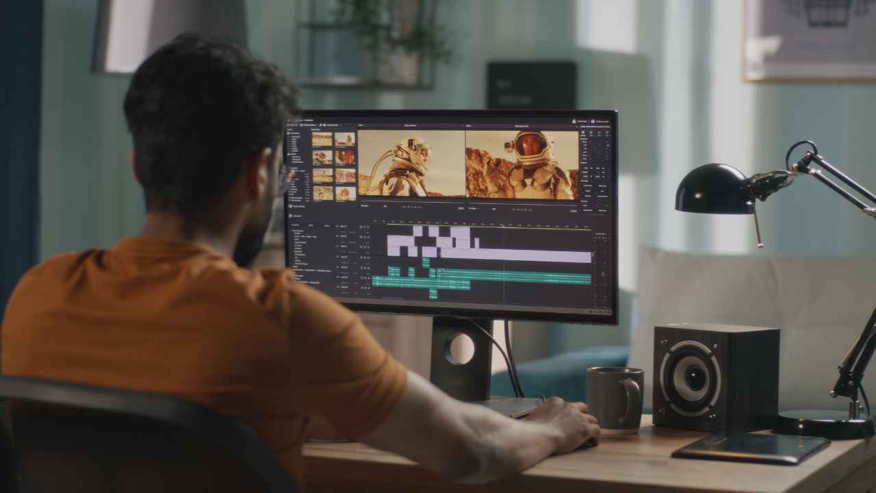 Professional video editor reviewing footage for Orlando brand video